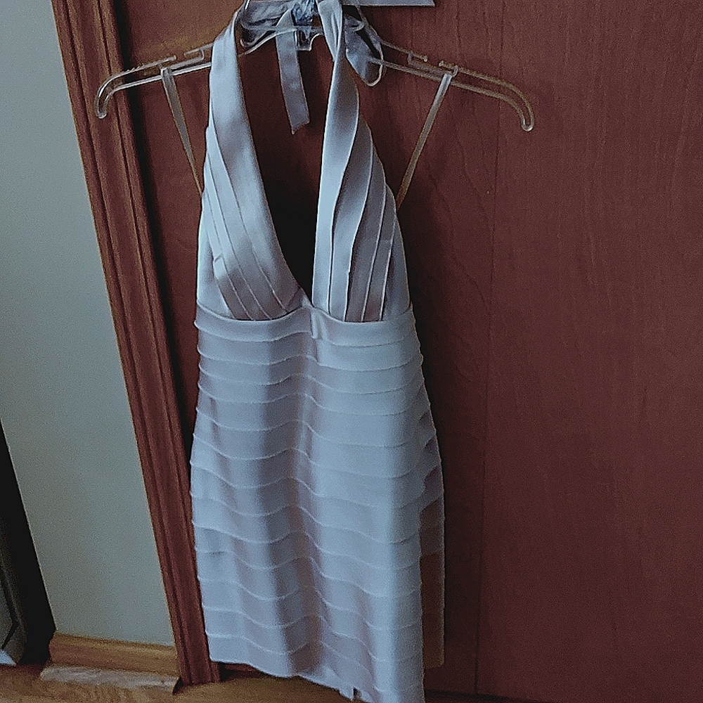 Short dress comes just above the knee, champagne color. Worn once.